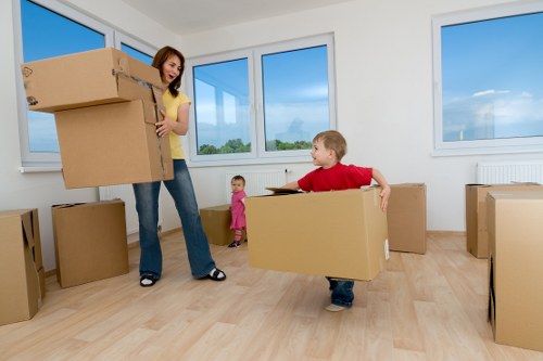 Professional movers carefully packing belongings